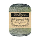 Skein of yarn with a Scheepjes label on a white background