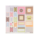 A sheet of cardstock stickers of frames, and labels from the brand s-e-i, featuring various pastel pink, orange, green, and brown designs with text like 'sweet thing', 'go girl.'