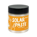 Jar of solar paste with orange label and black lid on a white background