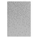 Textured gray mat with wavy patterns on a white background