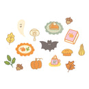 A collection of cute, autumn-themed embroidered patches or appliques on a plain white background, including a ghost, acorns, a mushroom, a slice of pumpkin pie, a book, a bat, a pumpkin, a cup of coffee, and leaves.