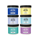 Six jars of Speedball Mid-Fire grip and tack enhancers arranged in two columns of three on a white background. The jars feature different colors: blue, yellow, light purple, light blue, teal, and purple, with black lids and white labels.