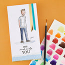 A personalized greeting card featuring a watercolor illustration of a man and the text 'one and only YOU', styled on an orange background with a paintbrush and a watercolor palette.
