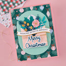 Christmas card with festive design and text on a pink background