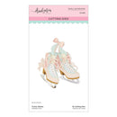 Spellbinders by Frank Garcia 'Frosty Skates' 18 cutting dies sheet, featuring a pastel illustration of two decorated ice skates on a white card with pink and teal header bands.