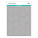 Spellbinders stencils with petal burst pattern on a gray background