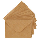 A fan stack of brown kraft paper envelopes on a plain white background.