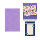 A purple embossed paper sheet shown next to a package of Templar Sculpey 3D paper and a decorated card made from the paper, on a white background.