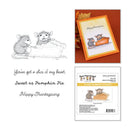 Thanksgiving-themed stamp and card set featuring a black-and-white mouse illustration with the phrase 'You've got a slice of my heart. Sweet as Pumpkin Pie Happy Thanksgiving,' shown alongside a sample orange-bordered card and the package insert for Spellbinders Cling Rubber Stamps.
