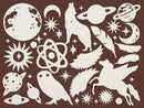 A collection of celestial and nature-themed silhouette cutouts or decals on a solid dark brown background, including planets, moons, stars, feathers, a wolf, an owl, a pegasus, and an atom symbol.
