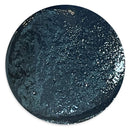 A circular swatch of dark navy blue nail polish with fine silver glitter, shown against a plain white background.