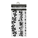 A hanging card displaying a set of black media stencils, including holly leaves, floral motifs, berries, and stars, with the brand name Stampery by Media Art visible at the top.