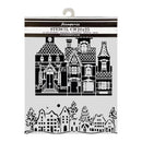 A packaged stencil featuring black architectural house and village silhouettes on a white backing card. The top header reads Stamperia and STENCIL CM20x25.