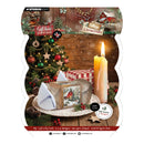 Studio Light Christmas gift box paper pad packaging, featuring 18 gift box designs with festive Christmas scenes, a candle, ornaments, and a decorated box on a white scalloped background.