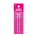 Susan Bates plastic yarn needles in a pink retail card package, containing 2 light blue plastic needles.