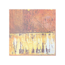 An abstract square cardstock featuring a textured, distressed design with a rusted brown upper half and a yellow, beige, and white lower half with dripping lettering.