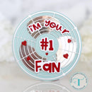 Circular decorative item with 'I'm your