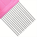Pink comb with metal teeth on a white background