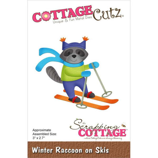 Cottage Cutz die set packaging with a raccoon on skis design.
