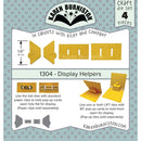 Karen Burniston craft die set packaging with yellow display helpers on a blue background