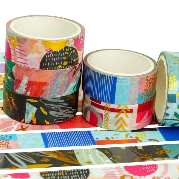 Colorful patterned tape rolls on a white background