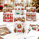A collection of Christmas-themed handmade greeting cards and sticker sheets arranged on a white wooden table. The cards feature festive winter scenes with picket fences, small decorated trees, red holiday garlands, and warm glowing cabin lights.