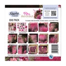 3 Quarter Designs 'Mrs Aeronaut' 8x8 paper pack, featuring 12 double-sided 8x8 papers, 2 die-cut sheets, and 1 tag page with a pink and black space-themed floral design.