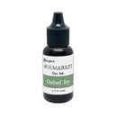 A bottle of Ranger 49 and Market Dye Ink in the shade Oxford Ivy, featuring a black bottle, black cap, and a white label with a green band.
