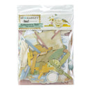 A packaged scrapbook ephemera set from 49th Market Kits, containing 158 pieces. The clear plastic bag shows a variety of paper cutouts in muted pastel colors including yellow, green, blue, and beige, along with small labels and decorative pieces.