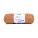 A single skein of Grundl Hello Again yarn in a warm, light tan-brown color, featuring a white paper label with green and purple text, set against a plain white background.