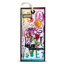 A rectangular handmade paper tag with a hanging loop, featuring colorful abstract text, floral illustrations, and decorative elements on a white background.