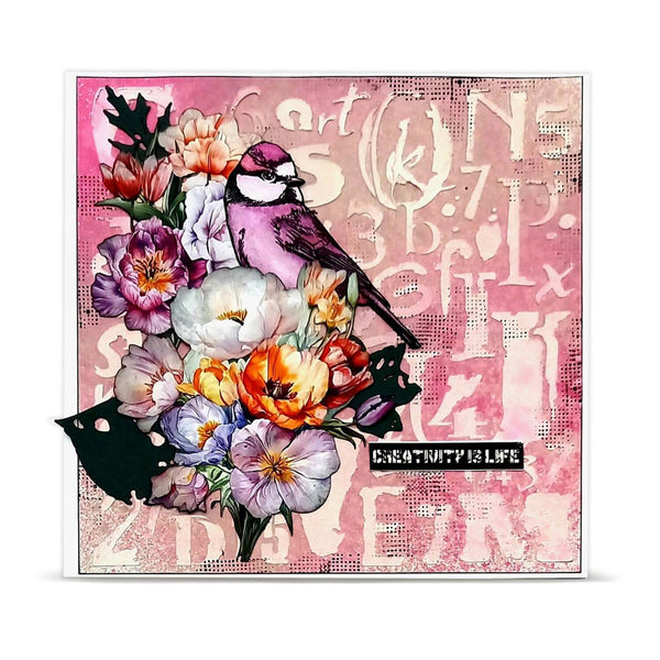 A square mixed-media art card featuring a pink and purple bird perched on a bouquet of colorful flowers, set against a pink background with abstract text and textured patterns. A small black label at the bottom reads 'CREATIVITY IS LIFE'.