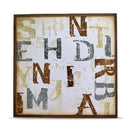 A square framed art print featuring distressed, stylized letters spelling out 'SHEILA' in brown, gray, and gold tones on a cream background with a dark brown frame.