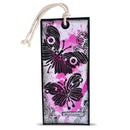 A rectangular paper bookmark or gift tag with a hanging rope loop, featuring black butterfly and floral stamp designs over a pink, white, and gray splattered background. The word 'sweetheart' is printed at the bottom.
