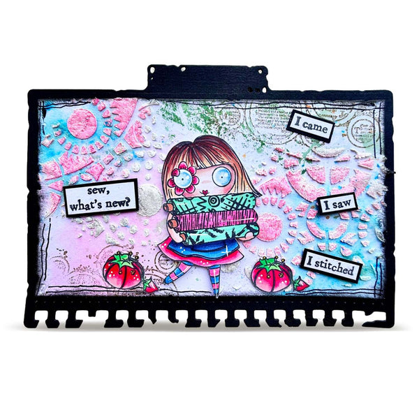 A square mixed-media art plaque featuring a whimsical cartoon girl holding a sewing machine, surrounded by colorful abstract patterns, strawberry motifs, and text labels including 'I came', 'I saw', 'I stitched', and 'sew, what's new?'. The plaque has a black border and is photographed against a plain white background.