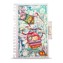 A spiral-bound scrapbook journal featuring a whimsical, colorful illustration of a pink-haired character holding a harmonica, surrounded by decorative elements like a needle, thread, and small text tabs on a textured, watercolor-style background.