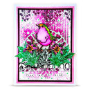 A square layered card featuring a vibrant pink bird perched among green leaves and pink flowers, set against a busy pink and white patterned background with the words 'free as a bird' at the bottom.