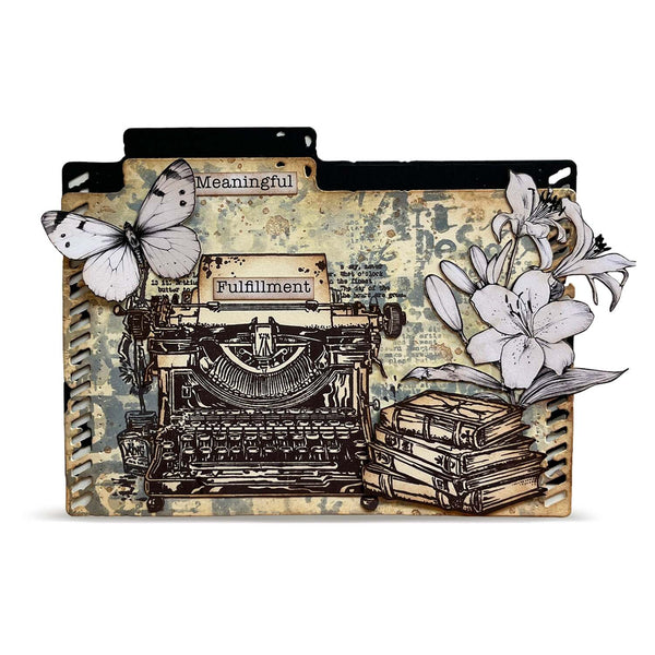 A decorative paper file folder or card featuring a vintage typewriter, stacked books, a butterfly, lilies, and the words 'Meaningful' and 'Fulfillment' on a distressed beige background.
