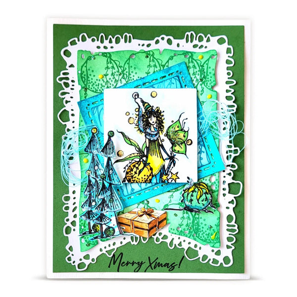 A handmade layered Christmas card featuring a green background, a white scalloped die-cut border, and multiple colorful graphic elements including a white central square with a whimsical elf illustration, blue and teal frames, a small gift box, and the text 'Merry Xmas!' at the bottom.