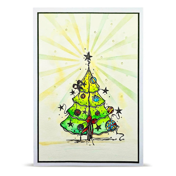 A square greeting card featuring a hand-drawn Christmas tree illustration. The tree is green with colorful ornaments and a red bow, set against a cream background with yellow and green sunburst rays.