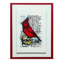A framed art print featuring a red cardinal perched on a yellow globe, set against a background of handwritten text and musical notation. The print is mounted on a white mat with a bold red frame.
