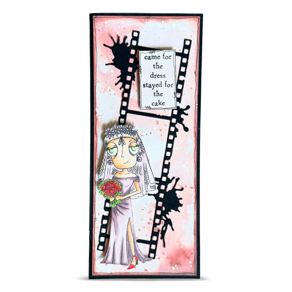 A vertical rectangular art print or card featuring a whimsical illustration of a bride in a white gown holding a red bouquet, overlaid with black film-strip and ink-splatter graphics and a small sign that reads, 'I came for the dress stayed for the cake.' The artwork has a pink watercolor background and is shown centered on a light gray studio background.