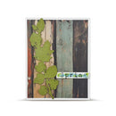 Wooden panel with green leaf cutouts and a 'Spring' label on a white background