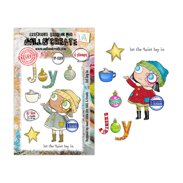 A clear stamp sheet and matching die-cut sticker set from Mill & Create's 'Snowdrops Series 3' featuring a cartoon girl in a red coat and green hat surrounded by festive ornaments, stars, hot cocoa cups, and the text 'let the Quiet Joy in'.