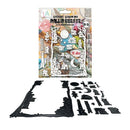 Packaged and unpackaged black metal die-cut craft sheets featuring whimsical castle, tower, moon, and star shapes, displayed against a plain white background.