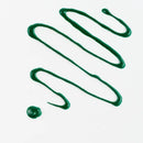 Green paint swatch on a white background
