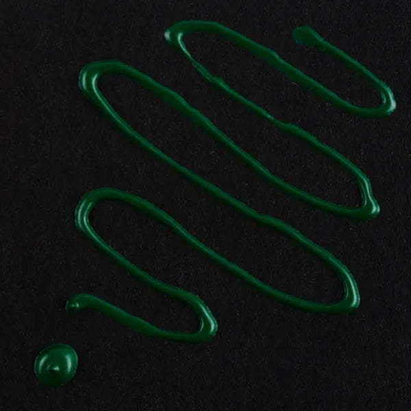 Green liquid smears on a black background