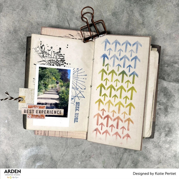 Open book with decorative pages and a photo clip on a textured surface, featuring the Arden Creative Studio logo.