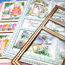 Collection of greeting cards with nature-themed illustrations and a wooden frame.