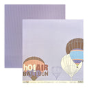 A square paper craft design sheet featuring hot air balloon illustrations on a pale lavender background, with a second matching lavender paper sheet partially visible behind it. The text 'hotAIR BALLOON' appears over one balloon, and small branding text is visible along the bottom edge.